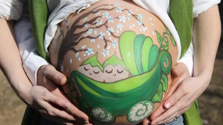 body paint pregnant belly